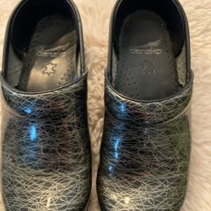 Dansko patent leather clogs